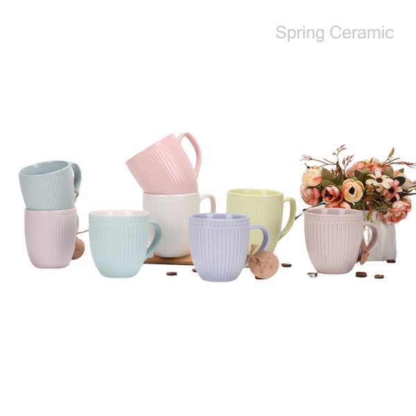 Embossed mug New bone china glossy inside matt color glaze outside with different design